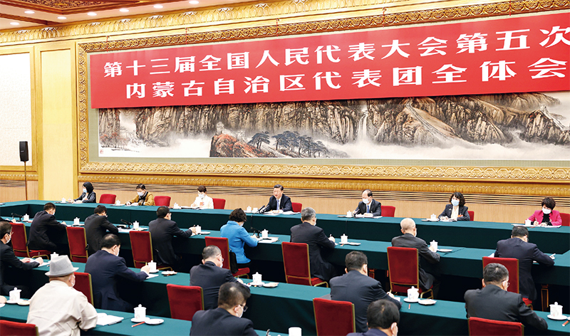 习近平：新时代党和人民奋进的必由之路